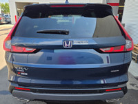 The 2026 Honda CR-V Hybrid Touring is the ultimate blend of modern efficiency and premium comfort. I... (image 4)
