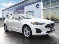 This Ford Fusion Hybrid boasts a Gas/Electric I-4 2.0 L/122 engine powering this Variable transmissi... (image 6)