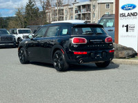 This 2017 Mini Cooper Clubman has a Black exterior and Black seats with seating for 5. Equipped with... (image 3)