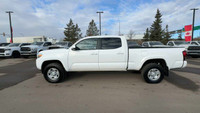 This Toyota Tacoma is equipped with: Fabric Seat Trim, AM/FM radio, 7 Inch Colour Touch Screen, Exte... (image 5)