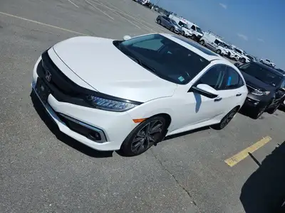 Come see this certified 2019 Honda Civic Sedan Touring Sedan | Leather | Roof | Nav | Auto | Heated...
