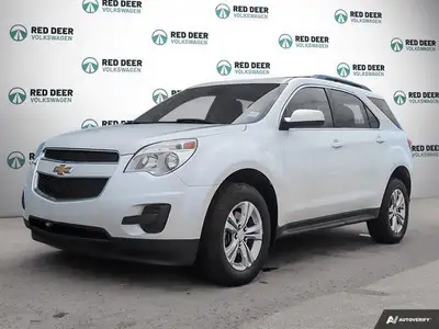 The 2014 Chevrolet Equinox LT AWD in a crisp white finish is a versatile and capable SUV designed to...