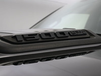 The 2021 Ram 1500 Rebel is a bold, off-road-focused full-size truck with a 5.7L HEMI V8 producing 39... (image 4)