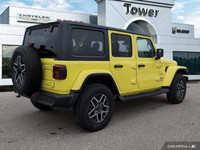 Turn heads and conquer any terrain in this vibrant 2024 Jeep Wrangler Sahara, boasting a striking Hi... (image 6)