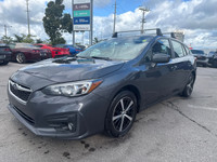Do not miss out on this low mileage, locally owned and traded 2019 Subaru Impreza Touring! Nicely op... (image 3)