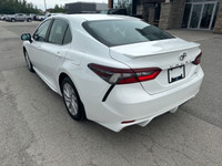 Discover the reliability and modern design of the 2022 Toyota Camry SE, now available at Blue Mounta... (image 2)
