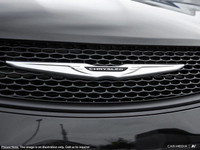 This Chrysler Grand Caravan has a trusty Regular Unleaded V-6 3.6 L/220 engine powering this Automat... (image 9)