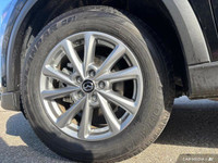 Experience the confident handling and sleek style of this 2024 Mazda CX-5 GS. Boasting a low 35,730k... (image 9)