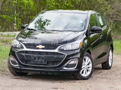 The 2021 Chevrolet Spark 1LT is a compact and efficient city car designed to make your daily drives...
