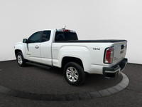 The GMC Canyon can carry up to 1620 pounds of people or cargo, and tow up to 7,000 pounds. White in... (image 2)