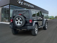 This 2017 Jeep Wrangler Unlimited Sahara, available at Ajax Hyundai, offers a perfect blend of rugge... (image 4)