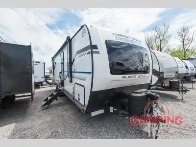 Forest River Cherokee Alpha Wolf travel trailer 25RB highlights: Outside Kitchen Front Private Bedro...