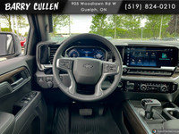 The all-new 2025 Chevrolet Silverado 1500 RST in pristine white is designed to deliver impressive pe... (image 9)