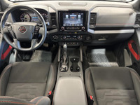 The 2023 Nissan Frontier Pro-4x, available at Moose Jaw Honda, is a robust and reliable truck design... (image 8)