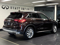 The 2021 Infiniti QX50 Luxe presents a compelling combination of power and sophistication with its e... (image 2)