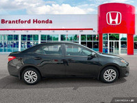 This 2019 Toyota Corolla LE boasts a sleek Black Sand Pearl exterior and a comfortable black interio... (image 6)