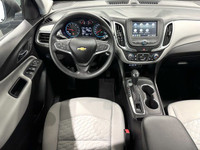 The 2019 Chevrolet Equinox LS is a compact SUV equipped with a 1.5L turbocharged I4 engine and a 6-s... (image 6)