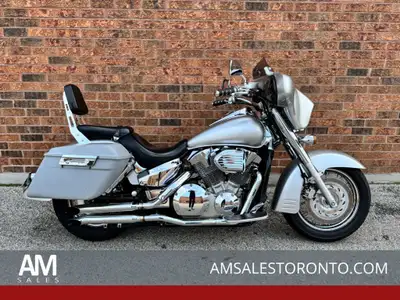 Honda VTX1300 with colour matching fairing with speakers, custom pipes, Hard saddlebags, passenger b...