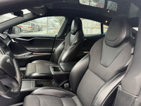 This sleek 2018 Tesla Model S in black is a stylish and eco-friendly choice for your next ride. With... (image 9)