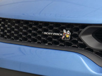 The 2023 Dodge Charger Scat Pack 392 in striking blue with a robust rear-wheel drive offers a dynami... (image 9)