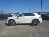 Command the road in this sleek 2023 Volkswagen Atlas Cross Sport Execline. This pristine Oryx White... (image 2)