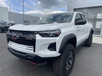 The 2025 Chevrolet Colorado ZR2, presented in Summit White with a Jet Black/Artemis interior, is eng... (image 3)