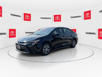 This, is a Black 2023 Toyota Corolla Hybrid with LE AWD Package, Featuring:~ No Accidents~ One Previ... (image 4)