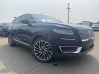 Under the glistening Rhapsody Blue exterior, the 2019 Lincoln Nautilus Reserve stands as a testament... (image 9)
