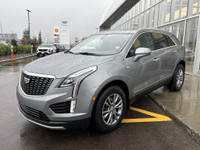 The 2023 Cadillac XT5, finished in a sleek Argent Silver Metallic paint, offers a confident all-whee... (image 3)