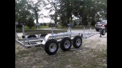Tri-axel sailboat trailer 10500 axle rating 9000lb capacity $6999 with 6 pads keel runner and guides...