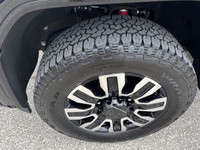 Experience power and luxury in the GMC Sierra 2500HD Denali Ultimate, painted in an eye-catching col... (image 1)