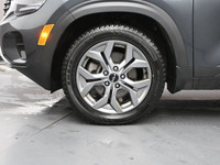 The 2024 Kia Seltos EX is a stylish and versatile compact SUV that delivers a refined driving experi... (image 3)