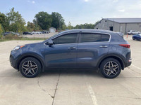 This Kia Sportage has a powerful Regular Unleaded I-4 2.4 L/144 engine powering this Automatic trans... (image 9)
