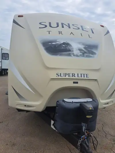 You Found it, a quality Double Bunk Trailer for under $25,000. With an Outside Kitchen, and a hidden...