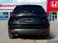 Experience the confident handling and sleek style of this 2024 Mazda CX-5 GS. Boasting a low 35,730k... (image 4)