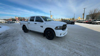 This Ram 1500 Classic is equipped with: Cloth Front 40/20/40 Bench Seat, Front 40/20/40 Split Bench... (image 1)
