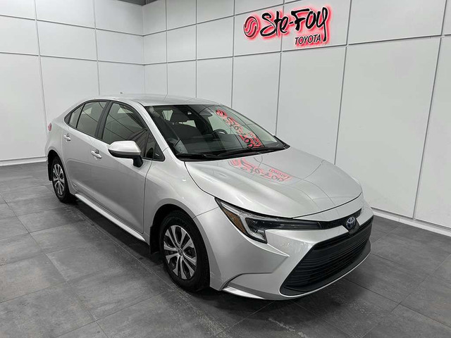 2023 Toyota Corolla LE HYBRIDE AWD - VOLANT CHAUFFANT - SIRIUS X in Cars & Trucks in Québec City