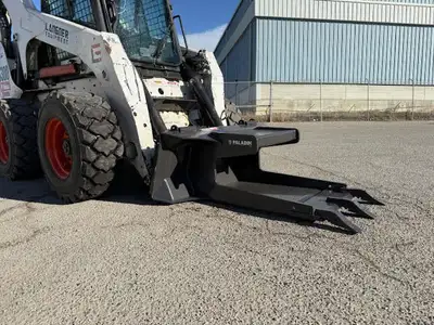 Excellent attachment for removing concrete on sidewalks, driveways or any construction site End plat...