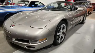 1999 Chevrolet Corvette Convertible. Pewter color and a black manual top. Overall, very nice conditi...
