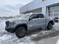 The 2025 GMC Sierra 1500 AT4X in Thunderstorm Grey Metallic is a formidable off-road truck that seam... (image 3)