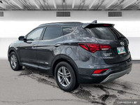 The 2017 Hyundai Santa Fe Platinum in Graphite offers all-wheel drive with a panoramic sunroof, heat... (image 3)