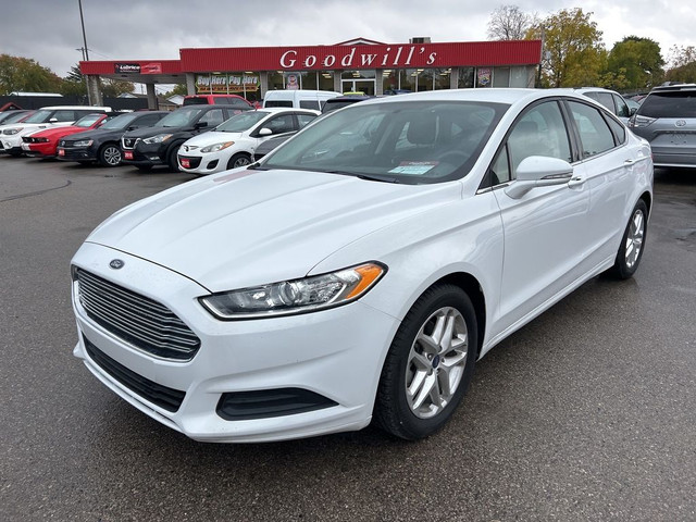  2013 Ford Fusion CLEAN CARFAX, SUPER LOW MILEAGE! in Cars & Trucks in London