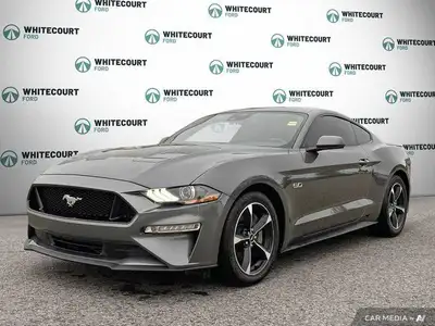 This Carbonized Grey Metallic 2022 Ford Mustang GT is an iconic sports car that delivers exhilaratin...