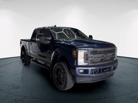 The 2019 Ford Super Duty F-350 SRW Lariat, in a striking blue with a 44 drivetrain, offers exception... (image 3)