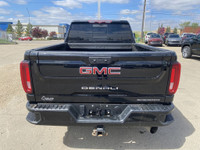 Forged to tackle the mightiest of tasks, the 2022 GMC Sierra 3500HD Denali, with its Ebony Twilight... (image 6)