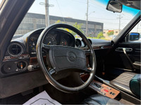 Step into timeless elegance with this beautifully preserved 1989 Mercedes-Benz 560SL, the final mode... (image 5)