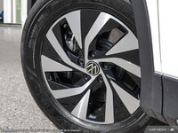 This Volkswagen Tiguan delivers a Intercooled Turbo Regular Unleaded I-4 2.0 L/121 engine powering t... (image 8)