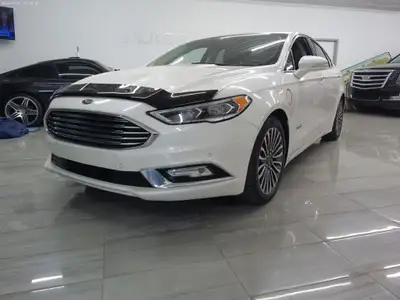 Superbe Ford Fusion Energi 2017 avec 159 738 kilomètres certifié, financement facile disponible, tou...