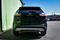 This 2022 Ford Edge is for sale today. This SUV has 92,656 kms. It's black in colour . It has a 8 sp... (image 4)