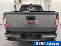 The 2022 GMC Canyon AT4 offers serious trail-ready capability in a midsize pickup format. Equipped w... (image 4)